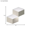Minimalist white metallic geometric wall mount light for corridor