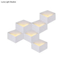 Minimalist white metallic geometric wall mount light for corridor
