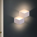 Minimalist white metallic geometric wall mount light for corridor