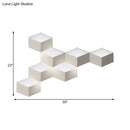 Minimalist white metallic geometric wall mount light for corridor