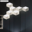 Minimalist white metallic geometric wall mount light for corridor