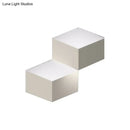 Minimalist white metallic geometric wall mount light for corridor