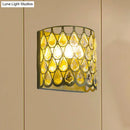 Minimalist white wall lamp with clear crystal teardrop for bedroom