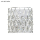 Minimalist white wall lamp with clear crystal teardrop for bedroom