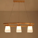 Minimalist wood and ivory glass pendant light dining room