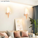 Minimalist wood and white glass wall mounted light fixture bedroom