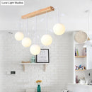 Minimalist wooden hanging lamp – dining room glass globe pendant