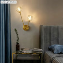 Minimalistic brass branch wall light with frosted glass for bedroom