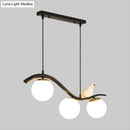 Modern black 3 light dining room pendant with clear white glass ball shade