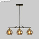 Modern black and brass 3-bulb smoke gray glass pendant dining hall island