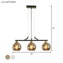 Modern black and brass 3-bulb smoke gray glass pendant dining hall island