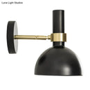 Modern black and brass domed wall lamp for bedroom bedside