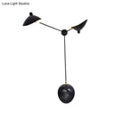 Modern black and brass duckbill wall lamp – living room metallic shade