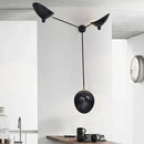Modern black and brass duckbill wall lamp – living room metallic shade