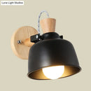 Modern black and brass metal wall light bedroom sconce with wood top