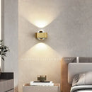 Modern black and copper bedroom wall lamp with glass dome