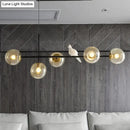 DecorBites™ Brass Sphere Ceiling Light with Adjustable Cord - Industrial 5-Light Island Pendant, Amber/Milky White/Smoke Grey Glass Shades