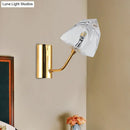 Modern black and gold faceted glass wall sconce stairway light