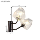 Modern black and gold faceted glass wall sconce stairway light