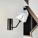 Modern black and gold faceted glass wall sconce stairway light