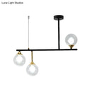 Modern black and gold globe pendant light for dining room