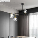 Modern black and gold globe pendant light for dining room