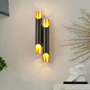 Modern black and gold tubular aluminum wall sconce for living room