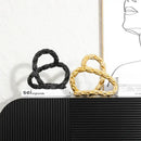 Modern black and golden knot chain sculpture living room decor