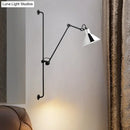 Modern black and white articulated bedroom wall lamp direct wired