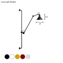 Modern black and white articulated bedroom wall lamp direct wired