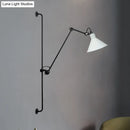 Modern black and white articulated bedroom wall lamp direct wired