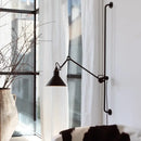 Modern black and white articulated bedroom wall lamp direct wired