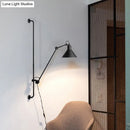 Modern black and white articulated bedroom wall lamp direct wired