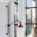 Modern black and white articulated bedroom wall lamp direct wired