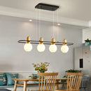Modern black and wood frosted glass orb pendant light kitchen island