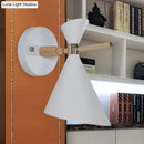 Modern black angle shade wall sconce with wood arm bedroom light