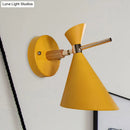 Modern black angle shade wall sconce with wood arm bedroom light