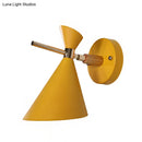 Modern black angle shade wall sconce with wood arm bedroom light