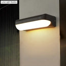 DecorBites™ Modern Black Acrylic Wall Sconce with Flush Capsule Design and Half-Bulb Mounting