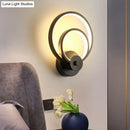 DecorBites™ Sleek Acrylic Loop LED Wall Sconce - Stylish Bedroom Light Fixture