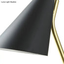 Modern black cone shade wall sconce with brass arm – bedroom light
