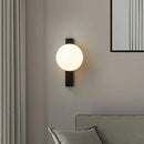 Modern black copper wall sconce – bedroom frosted glass globe light