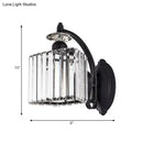 Modern black crystal wall light with curved arm for living room