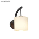 Modern black finish wall lamp bedroom cylindrical glass sconce