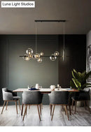 Modern black glass globe pendant light for dining table