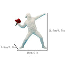 Modern black glossy bansky flower thrower sculpture office decor