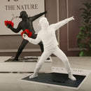 Modern black glossy bansky flower thrower sculpture office decor