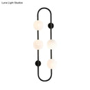 Modern black & gold globe wall sconce bedroom white glass light