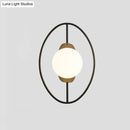 Modern black & gold metal halo ring wall lamp with white glass bedroom