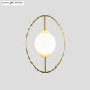 Modern black & gold metal halo ring wall lamp with white glass bedroom